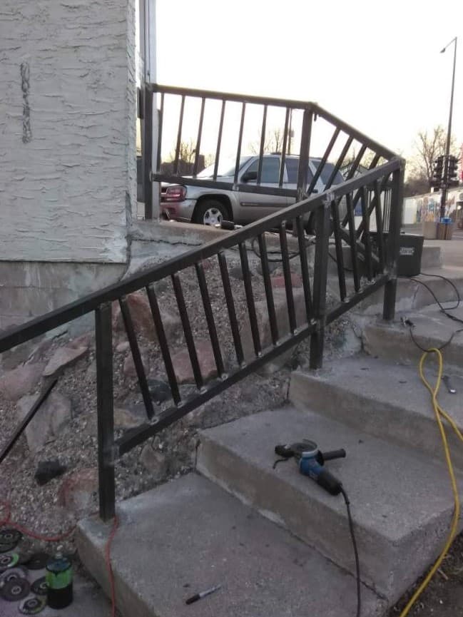 picture of a railing that has been welded by a welder